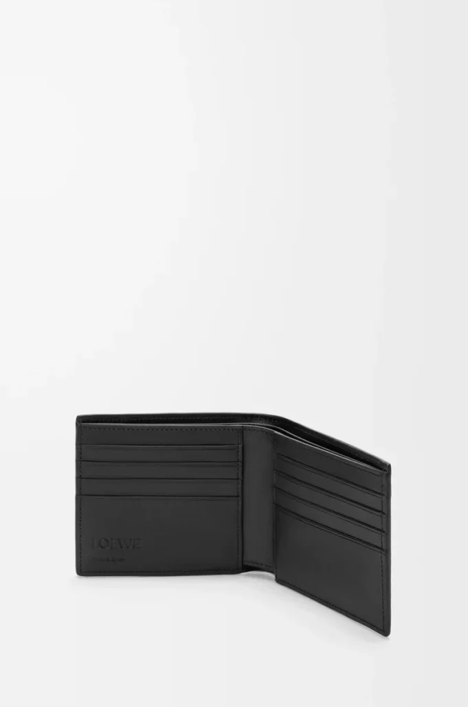 Esnek damarlı dana derisinden üretilmiş Puzzle bifold cüzdan Siyah