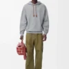 Geniş kesim pamuklu gri melanj kapüşonlu sweatshirt