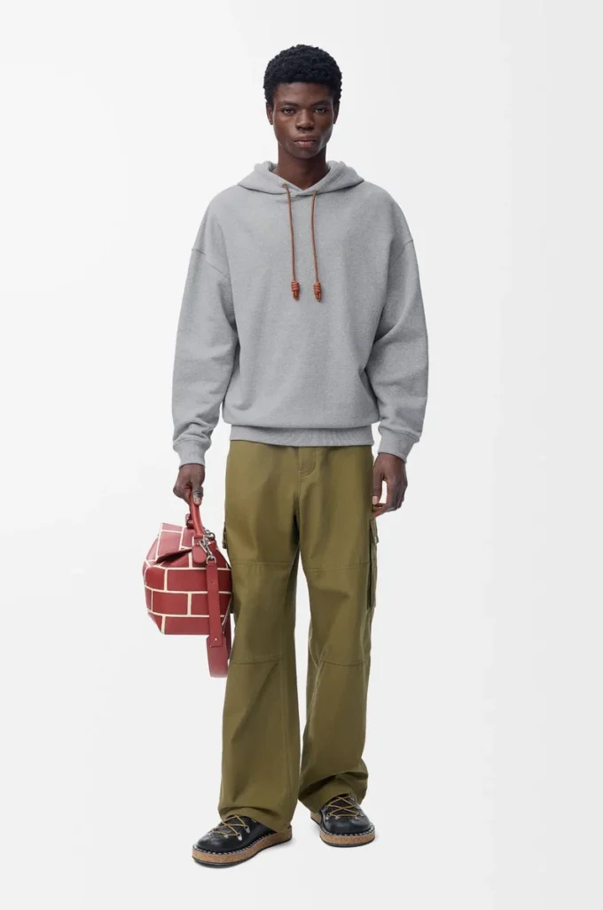 Geniş kesim pamuklu gri melanj kapüşonlu sweatshirt
