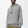 Geniş kesim pamuklu gri melanj kapüşonlu sweatshirt