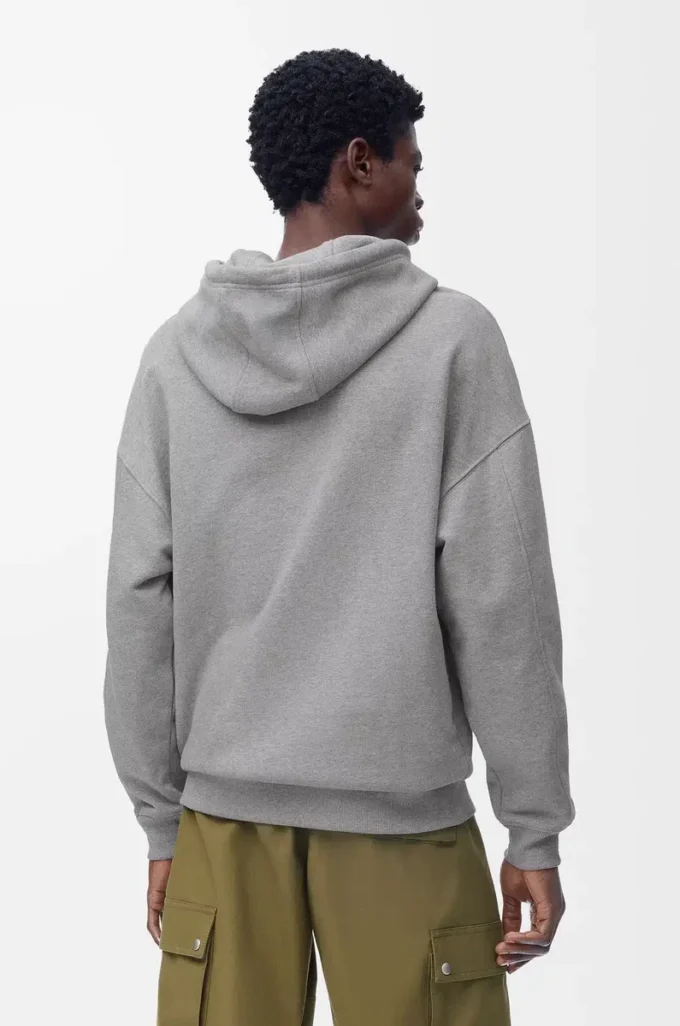 Geniş kesim pamuklu gri melanj kapüşonlu sweatshirt