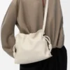 Nappa dana derisinden orta boy Flamenco clutch Sea Salt