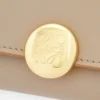 Parlak nappa dana derisinden üretilmiş çakıl desenli kontinental cüzdan Kum rengi