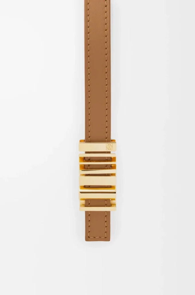 Pürüzsüz dana derisinden LOEWE Grafik kemer Meşe/Altın