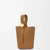 Pürüzsüz dana derisinden üretilmiş Mini Pebble kova çanta Oak