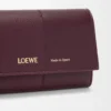 Pürüzsüz ve damarlı dana derisinden üretilmiş küçük dikey cüzdan Koyu Bordo