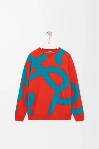 Yün ve pamuktan üretilmiş mavi/turuncu sweatshirt