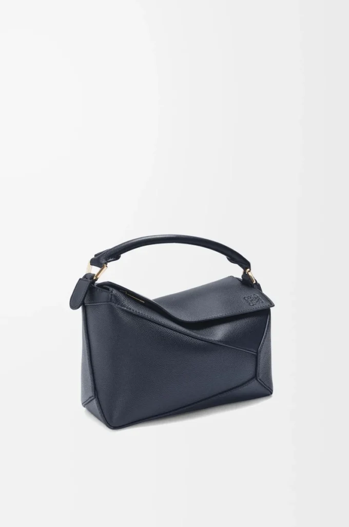 Yumuşak damarlı dana derisinden küçük Puzzle Edge çanta Deep Navy